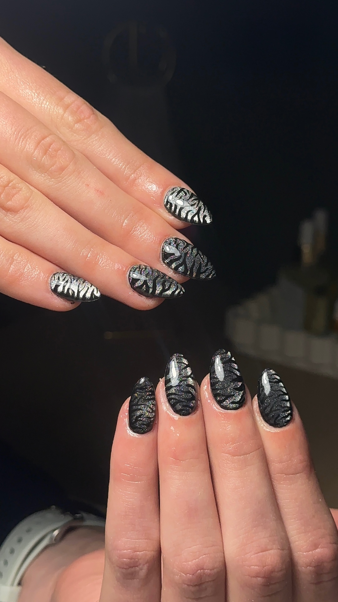 Holographic zebra print nail art