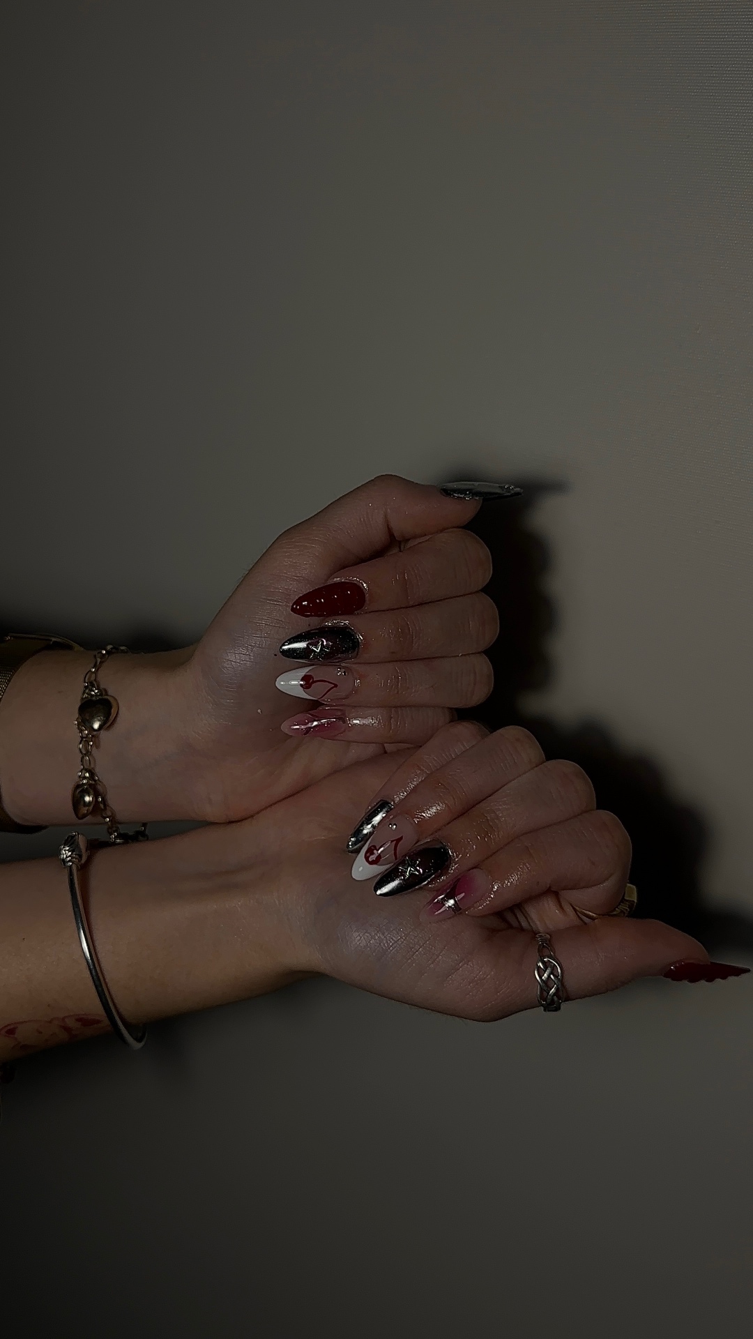 Dark chrome cherry nail art
